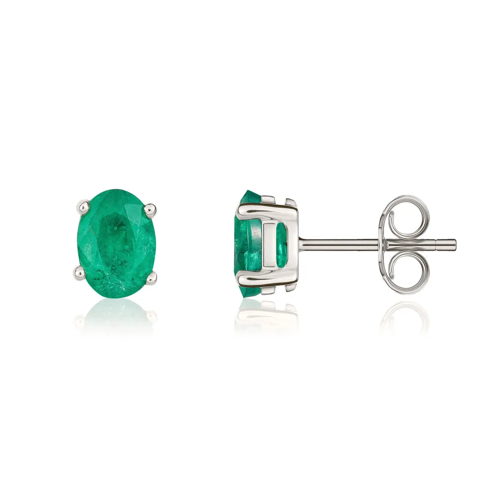 9ct White Gold Emerald 7x5mm Oval Claw Set Stud Earrings