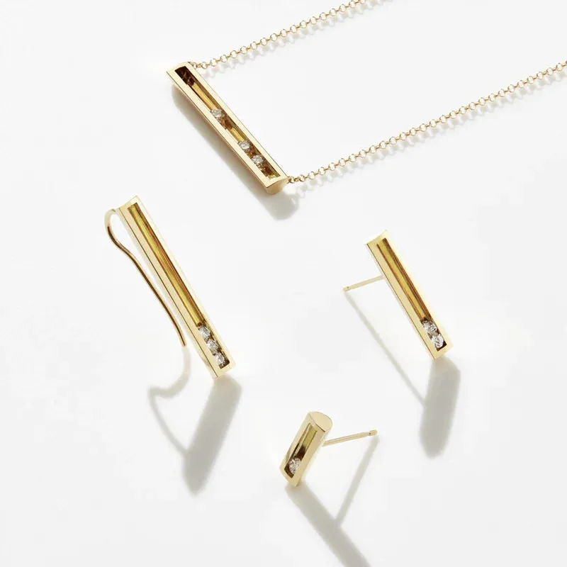 Moving L 18K Gold Earring w. Diamonds